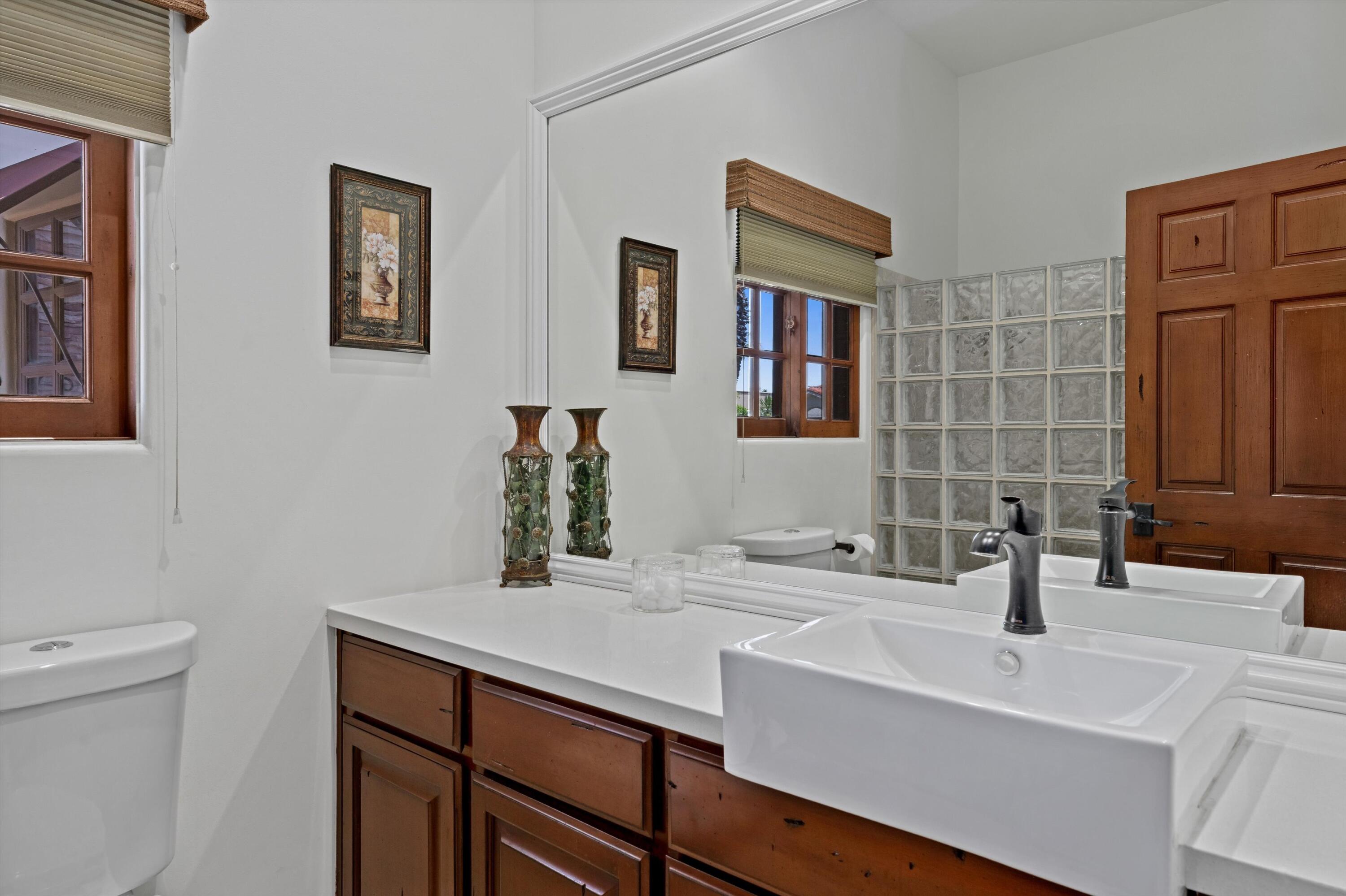 43190 Moore Circle Bermuda Dunes, CA 92203 - Photo 31 of 50 a bathroom with a sink and a toilet