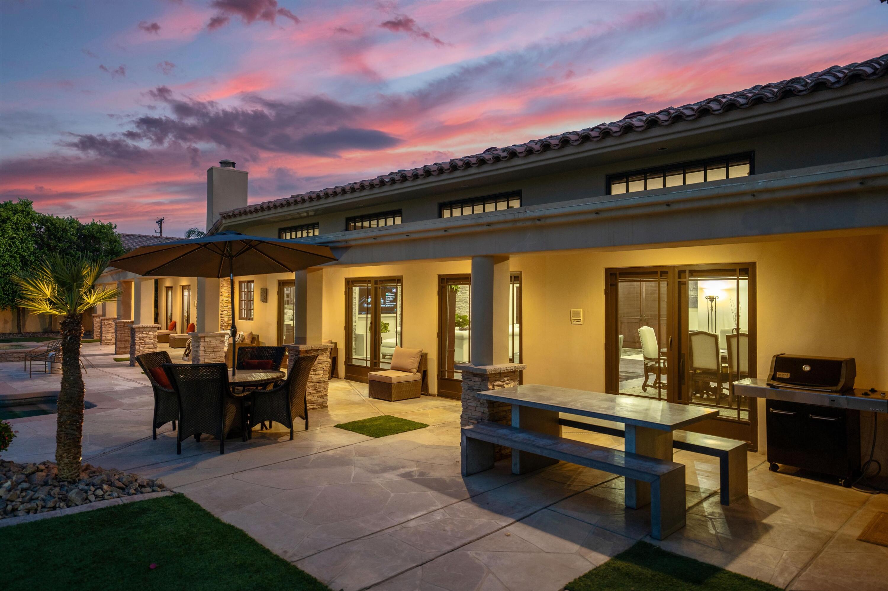 43190 Moore Circle Bermuda Dunes, CA 92203 - Photo 36 of 50 a view of a patio with swimming pool table and chairs