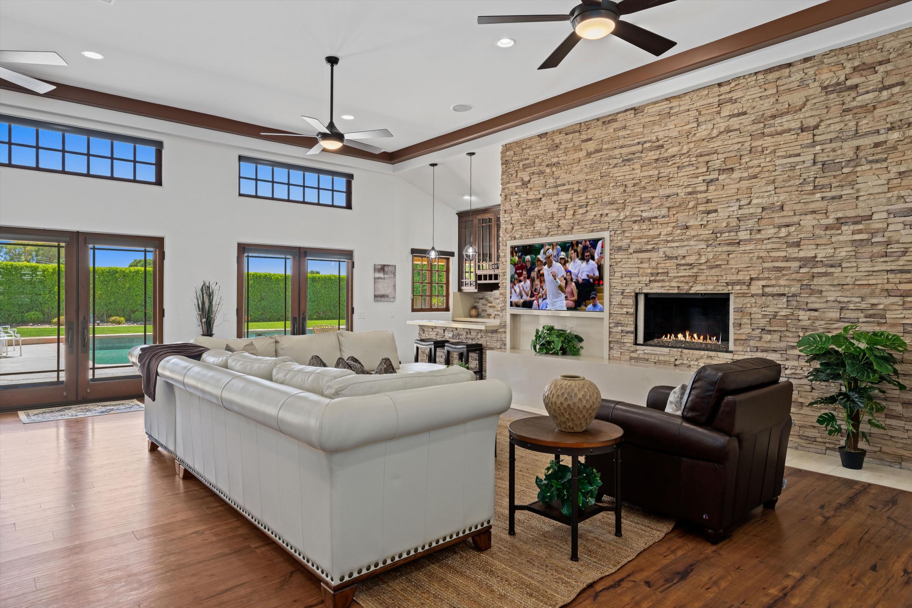 43190 Moore Circle Bermuda Dunes, CA 92203 - Photo 4 of 50 a living room with fireplace furniture and a flat screen tv