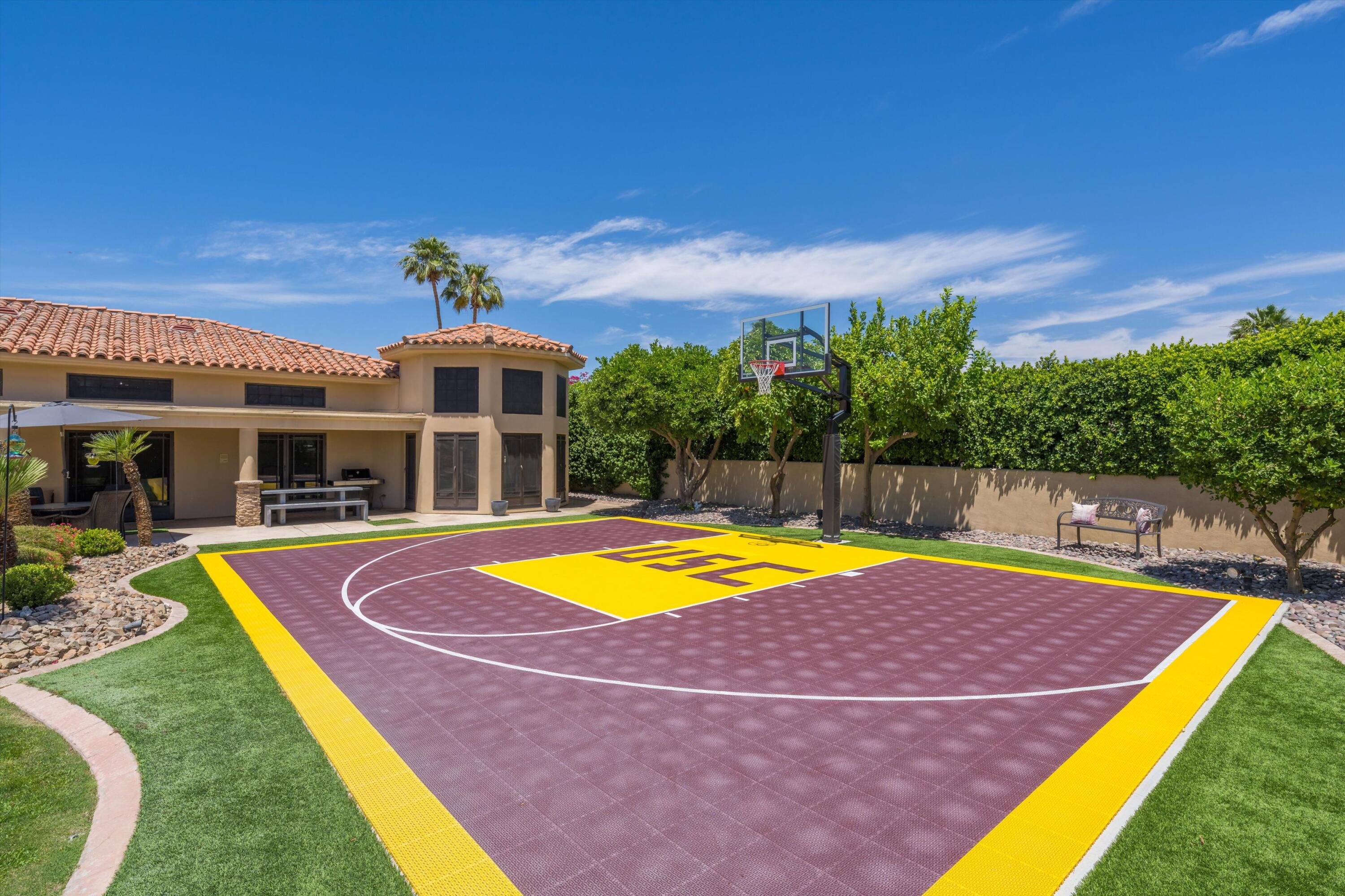 43190 Moore Circle Bermuda Dunes, CA 92203 - Photo 46 of 50 a view of a swimming pool with lounge chairs in the patio