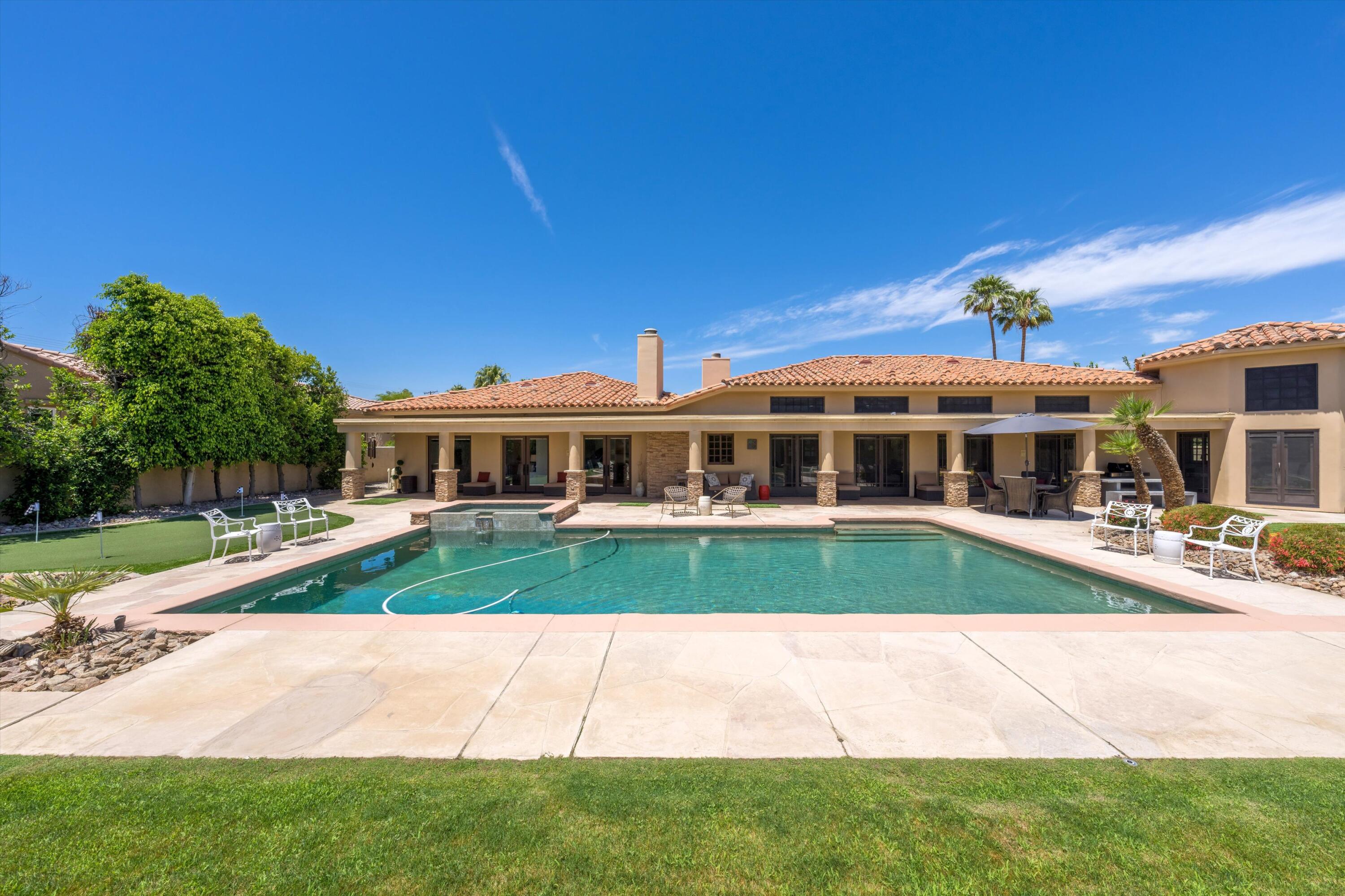 43190 Moore Circle Bermuda Dunes, CA 92203 - Photo 47 of 50 a front view of a house with a garden
