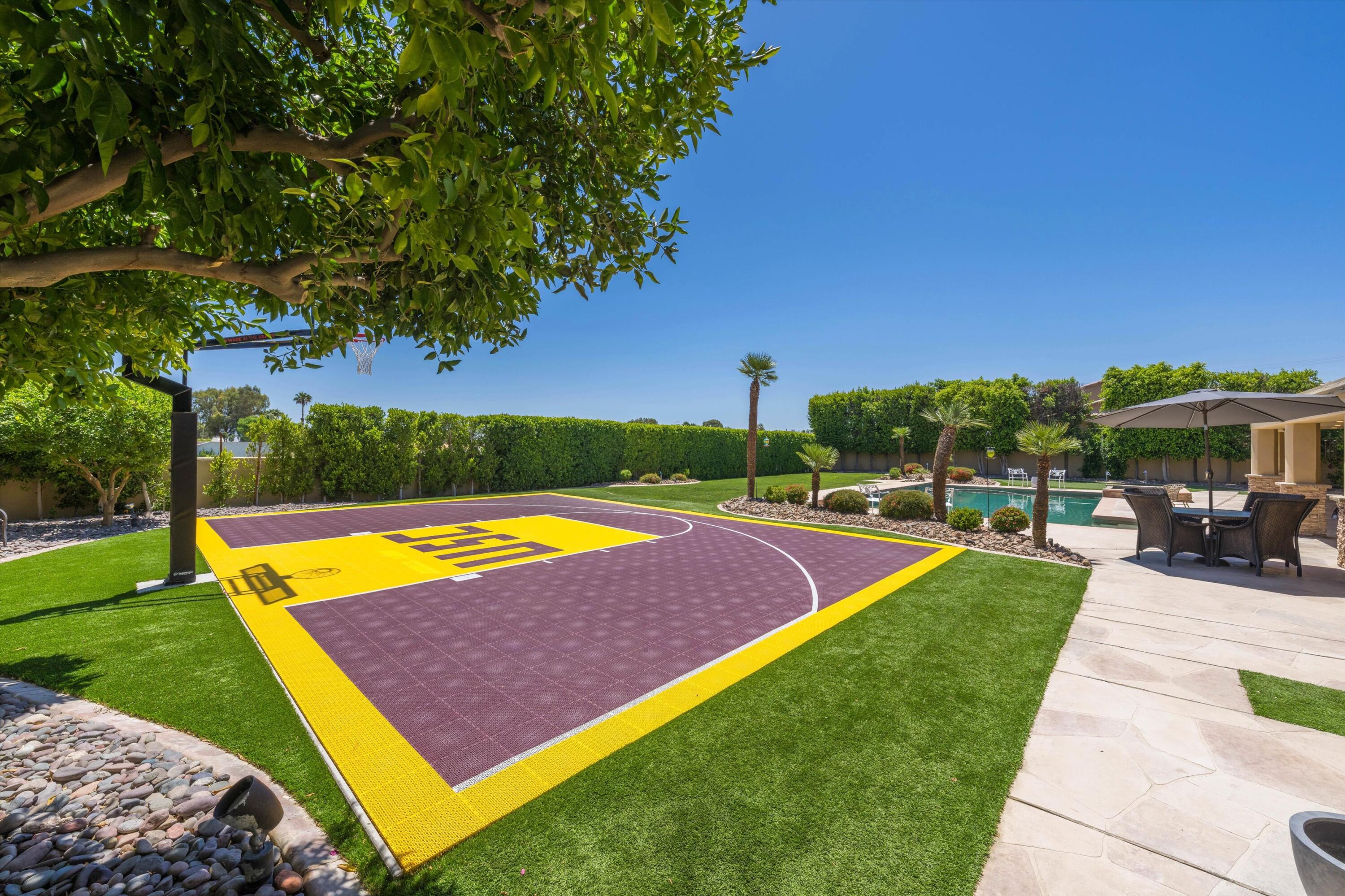 43190 Moore Circle Bermuda Dunes, CA 92203 - Photo 48 of 50 a view of swimming pool with lawn chairs and a big yard
