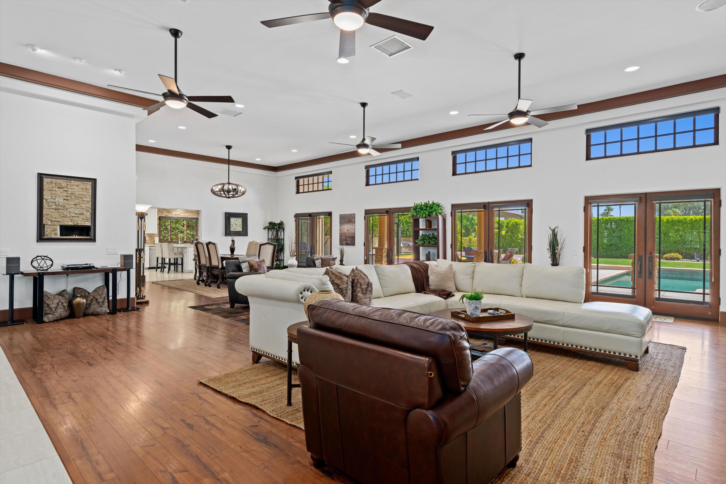 43190 Moore Circle Bermuda Dunes, CA 92203 - Photo 6 of 50 a living room with furniture kitchen view and a chandelier