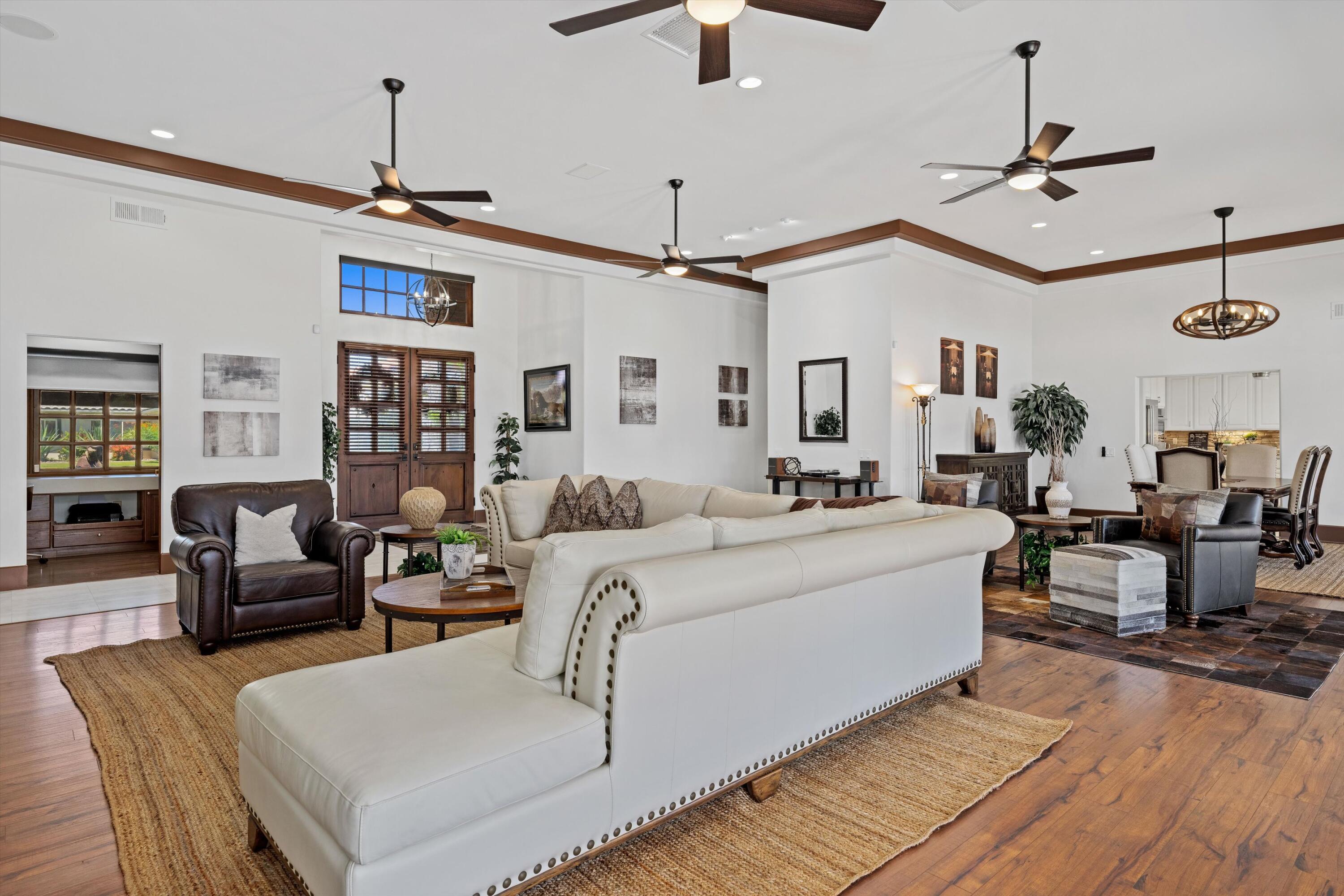 43190 Moore Circle Bermuda Dunes, CA 92203 - Photo 7 of 50 a living room with furniture kitchen view and a chandelier