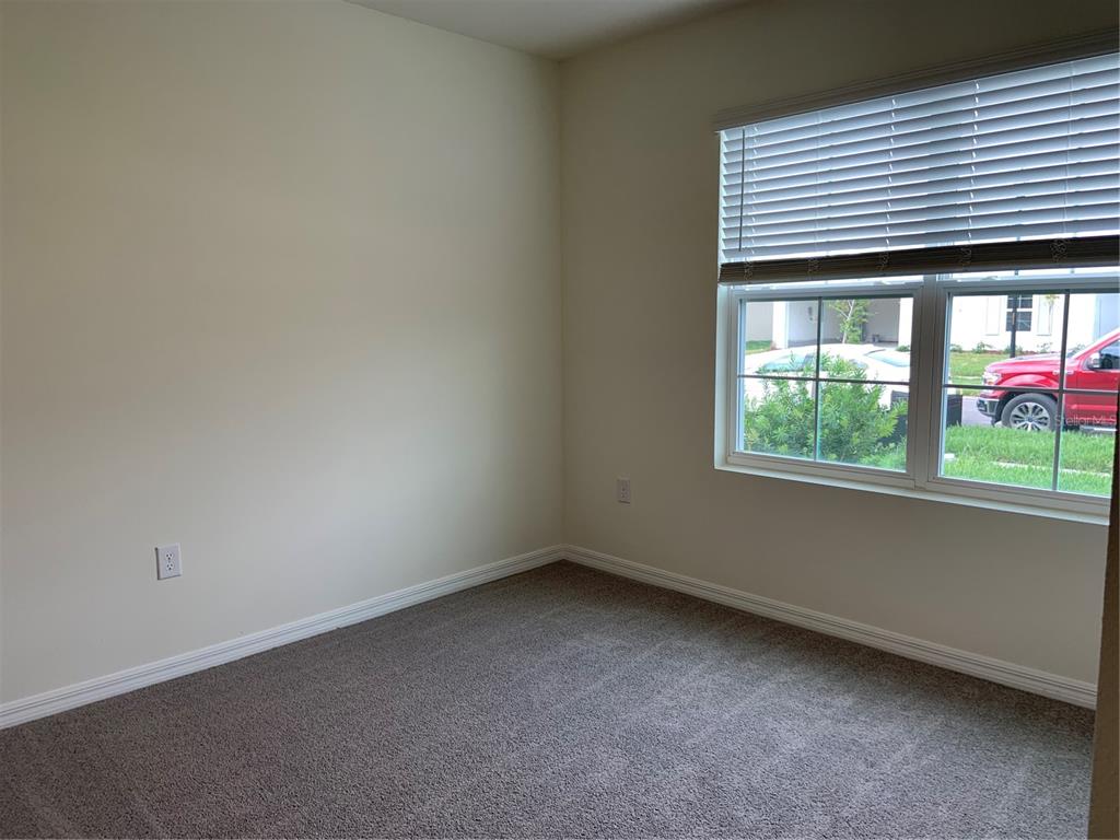 33327 Hamilton Hl Lane Wesley Chapel, FL 33545 - Photo 5 of 11 an empty room with a window