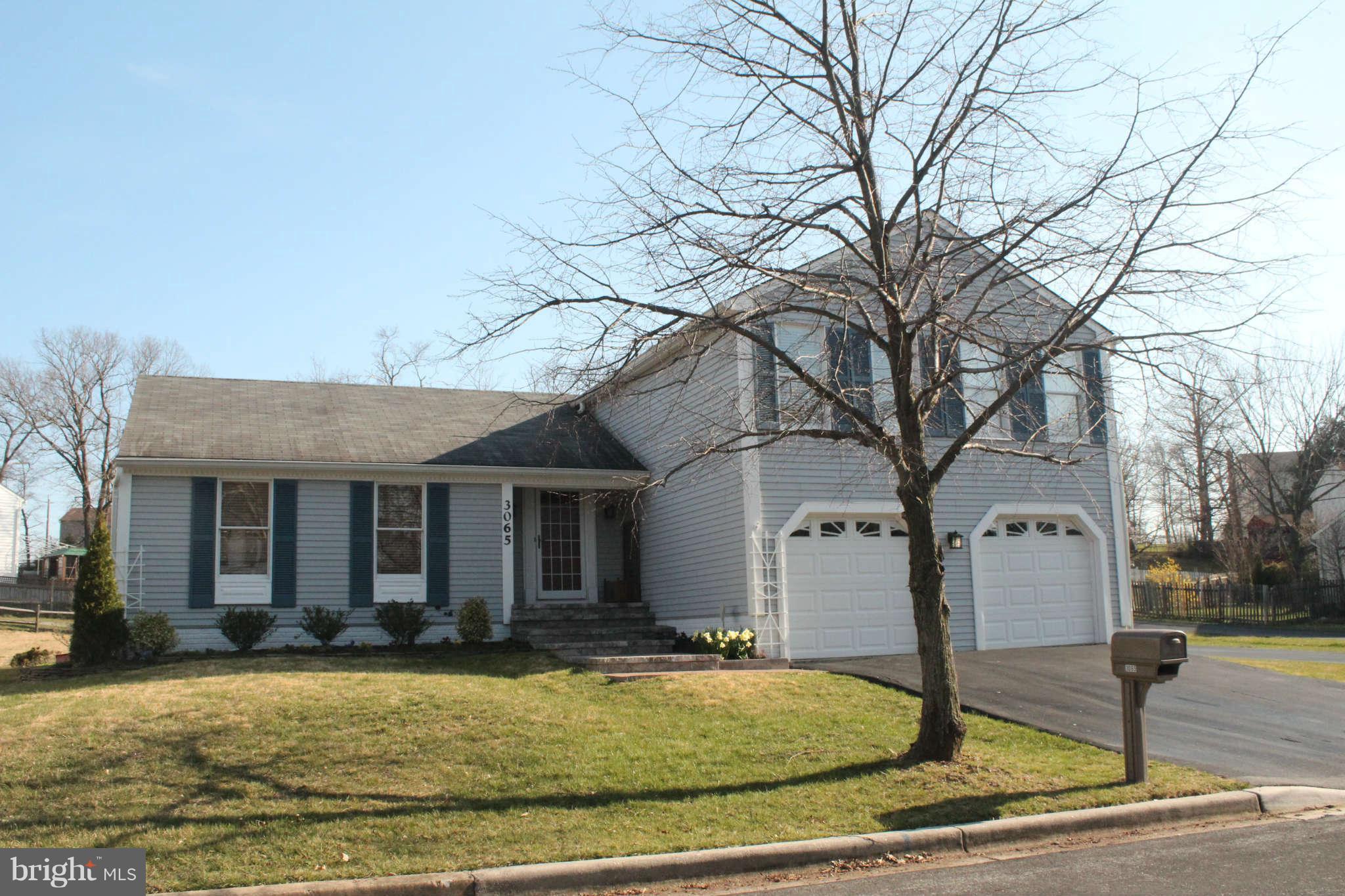 3065 Memory Lane Silver Spring, MD 20904 - Photo 1 of 29 a front view of a house with garden