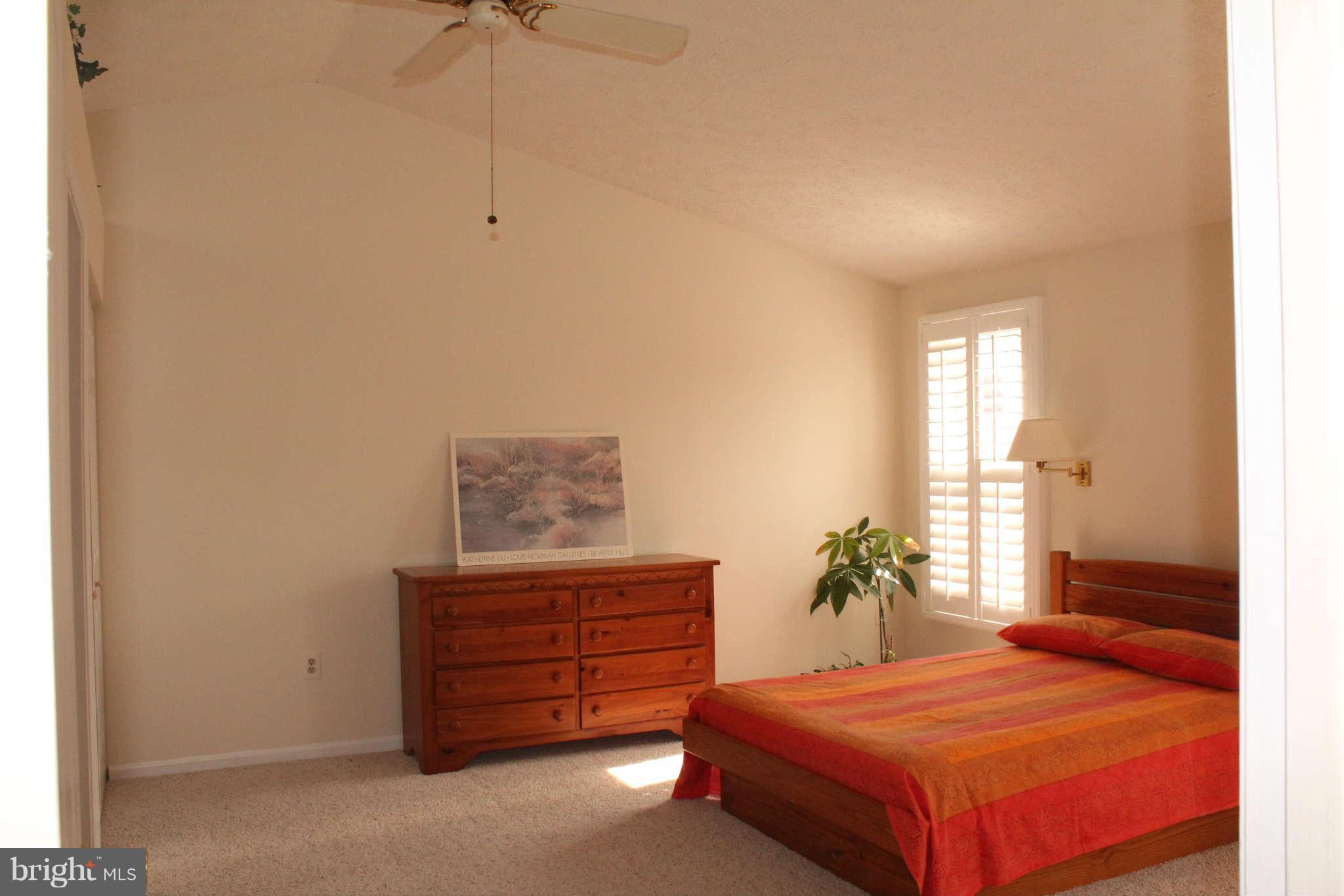3065 Memory Lane Silver Spring, MD 20904 - Photo 13 of 29 a bedroom with a bed and a dresser