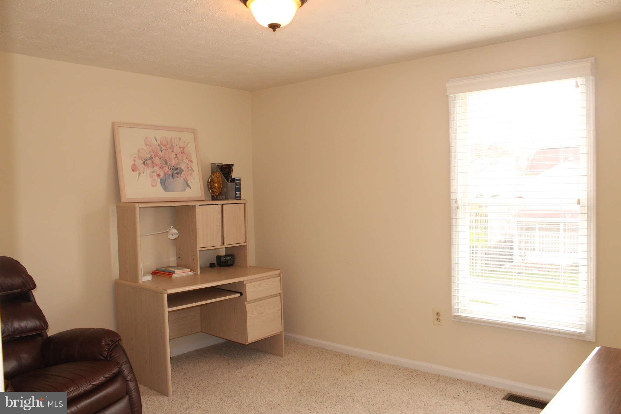 3065 Memory Lane Silver Spring, MD 20904 - Photo 16 of 29 a room with furniture and window