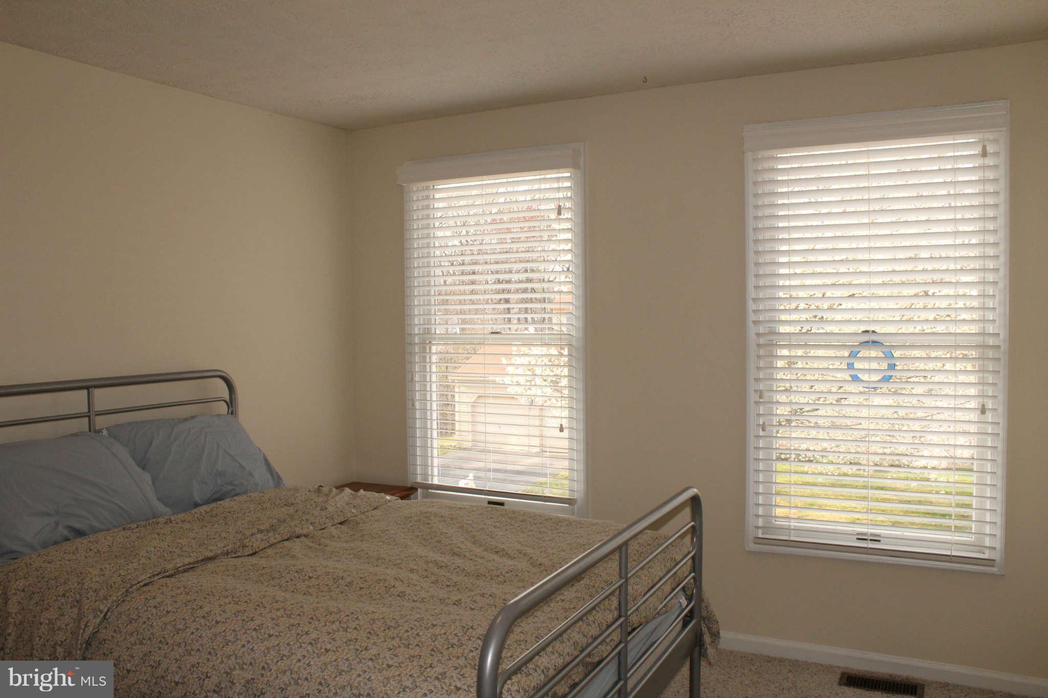 3065 Memory Lane Silver Spring, MD 20904 - Photo 18 of 29 a bedroom with a bed and a window