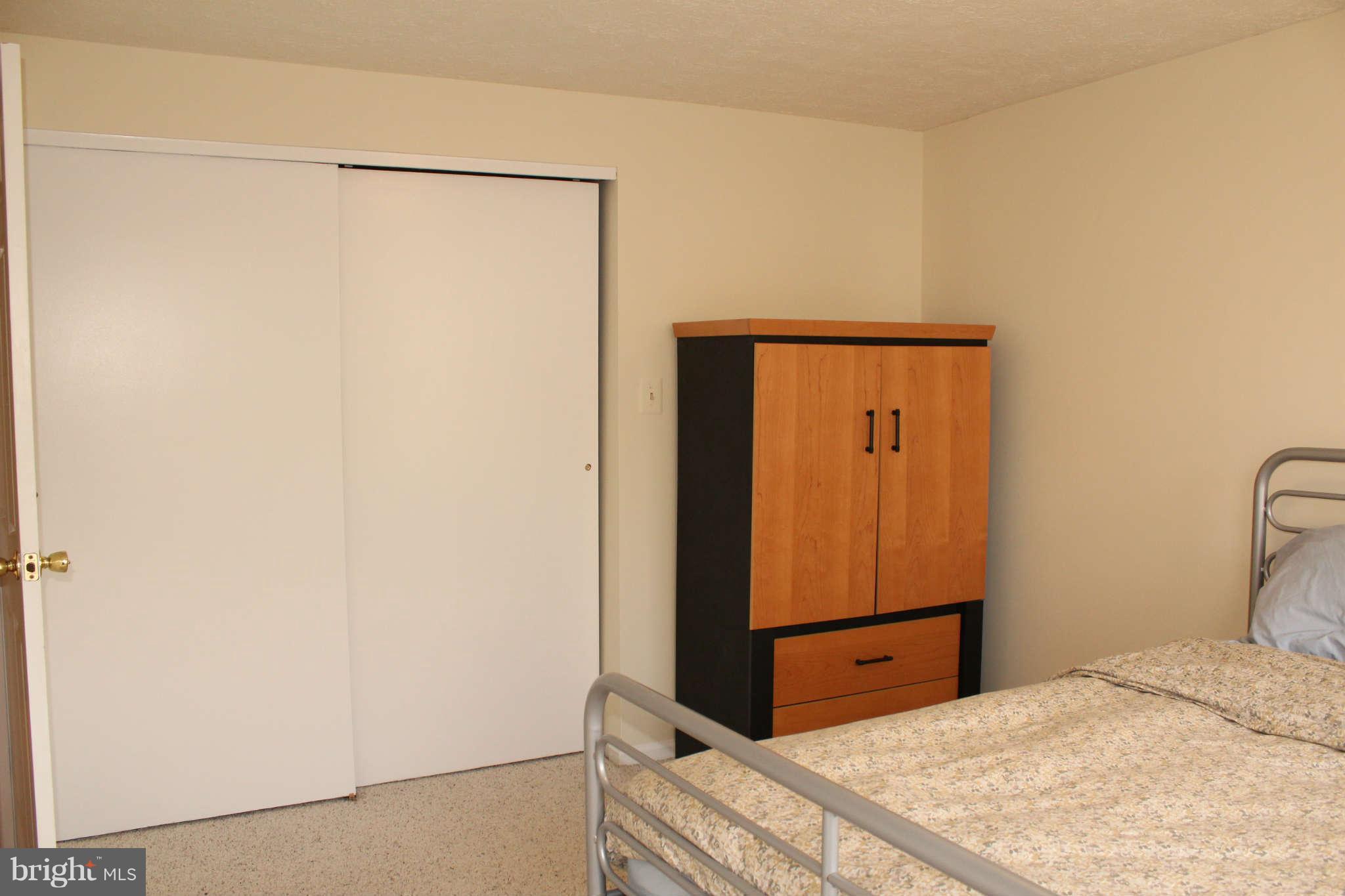 3065 Memory Lane Silver Spring, MD 20904 - Photo 19 of 29 a room with a bed and dresser