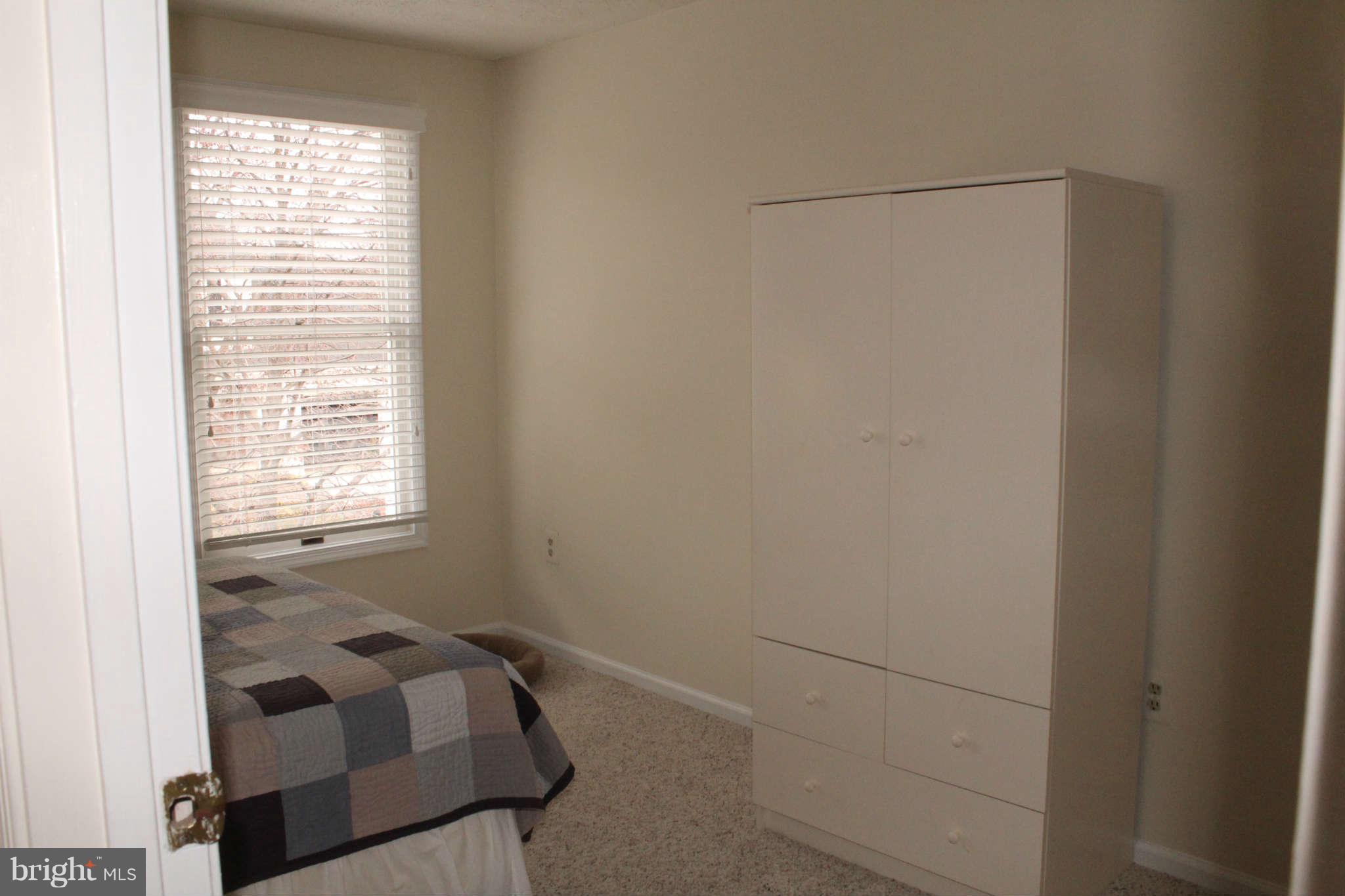 3065 Memory Lane Silver Spring, MD 20904 - Photo 21 of 29 a bedroom with a bed and a window