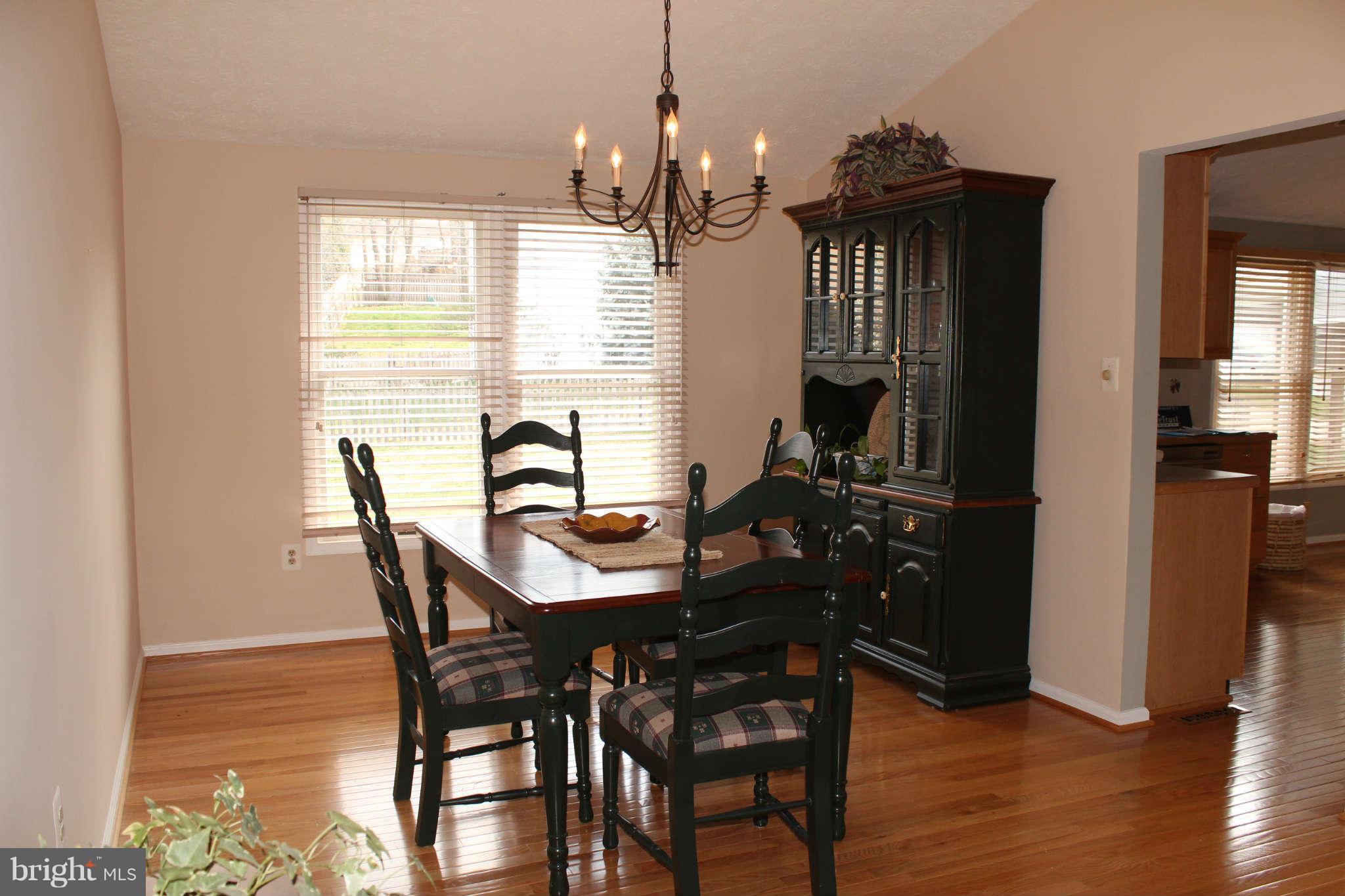 3065 Memory Lane Silver Spring, MD 20904 - Photo 6 of 29 a view of a dining room with furniture and window