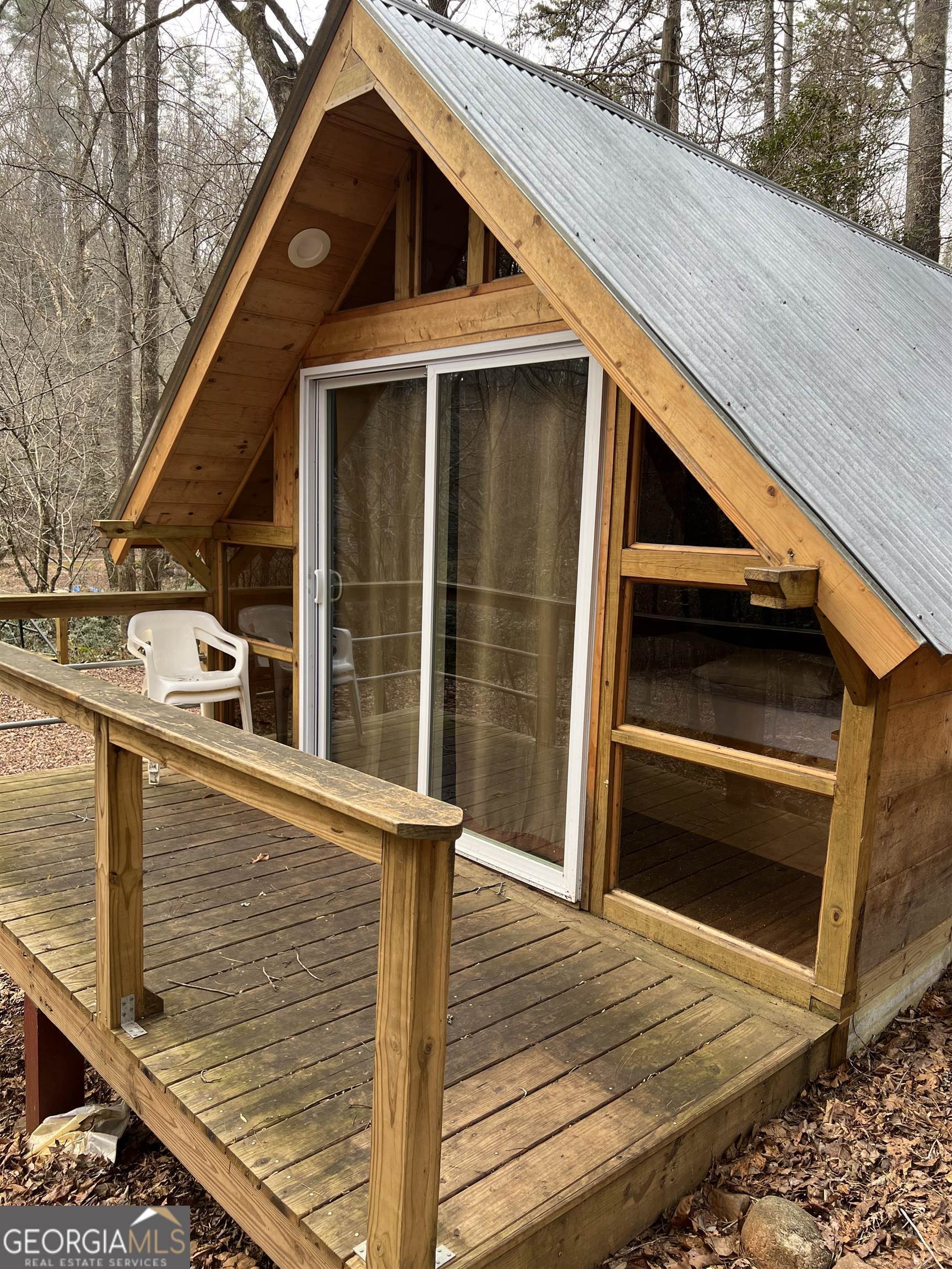 1402 Blackburn Road Cleveland, GA 30528 - Photo 1 of 1 a view of outdoor space and deck