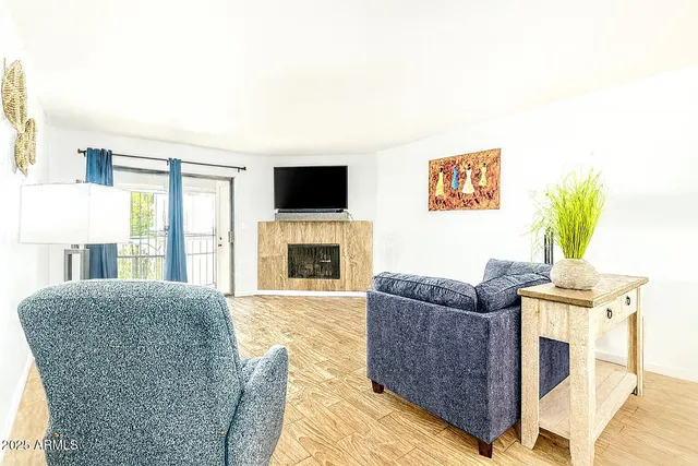 a view of a swimming pool with a lounge chairs