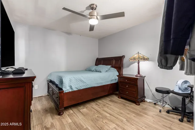 a room with pool table and windows