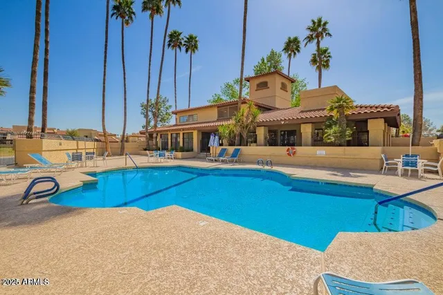 a view of a building next to a big yard