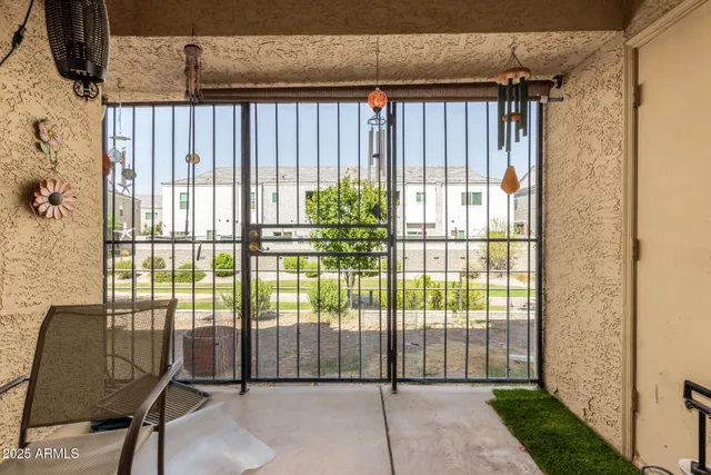a view of a car park in front of house