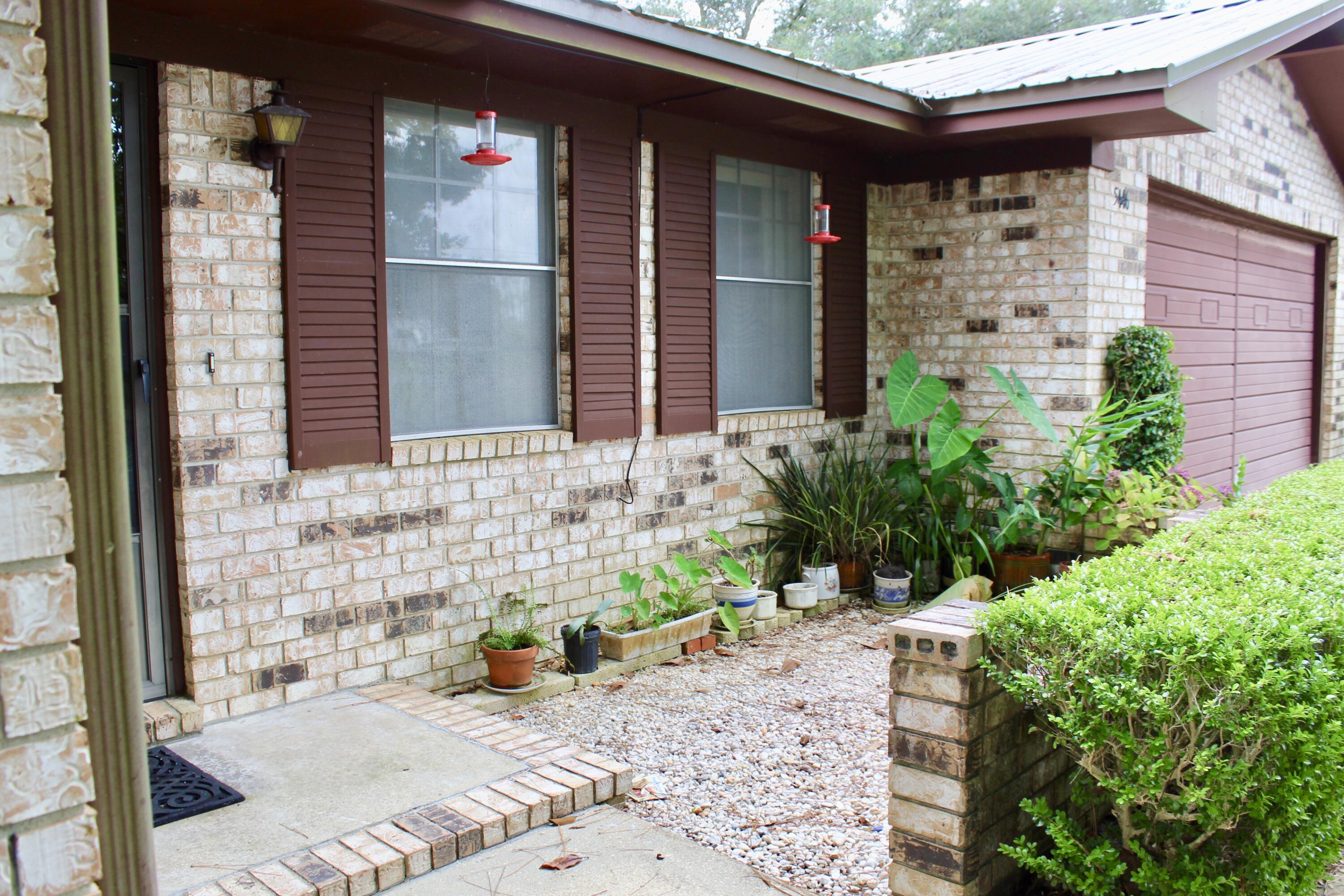 5446 Monterrey Road Crestview, FL 32539 - Photo 3 of 26 CV Landscaping 2