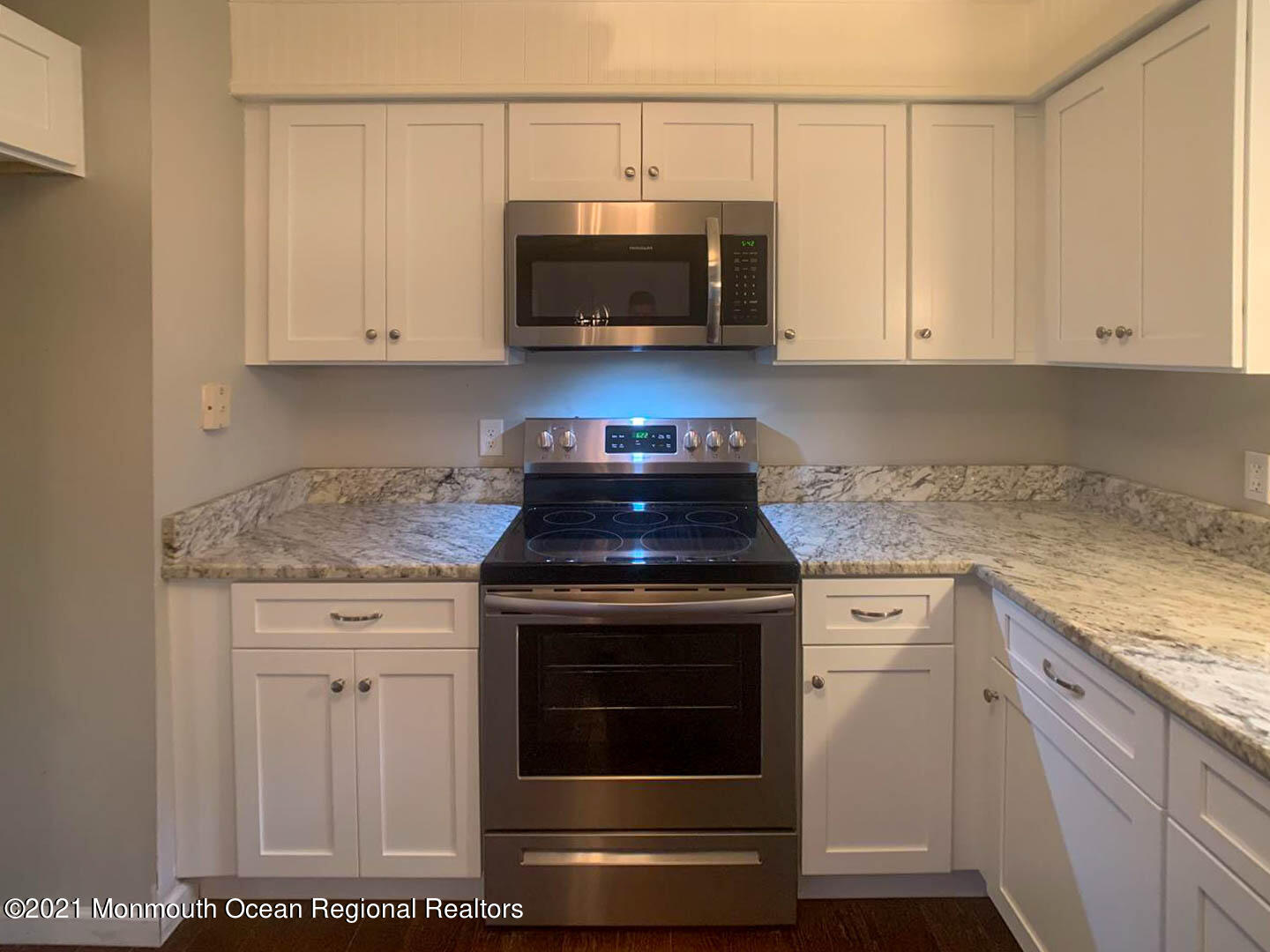 109 Beverly Drive Barnegat, NJ 08005 - Photo 11 of 20 a kitchen with granite countertop white cabinets and stainless steel appliances