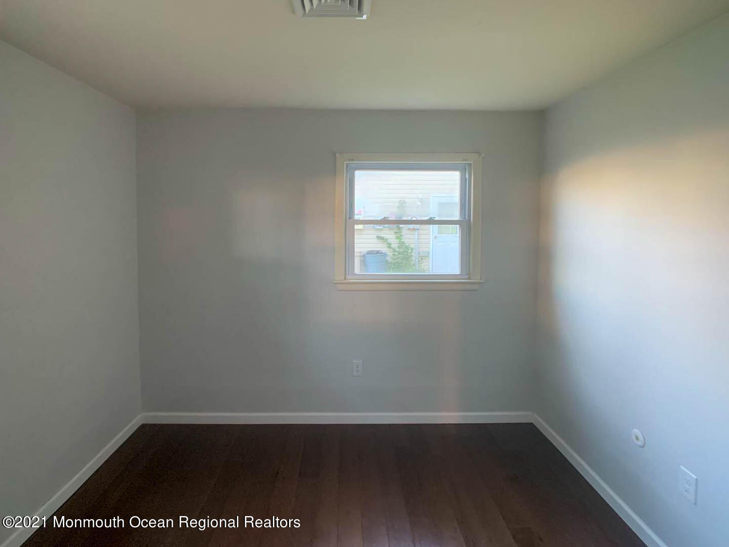 109 Beverly Drive Barnegat, NJ 08005 - Photo 18 of 20 a view of a small space with wooden floor and a window