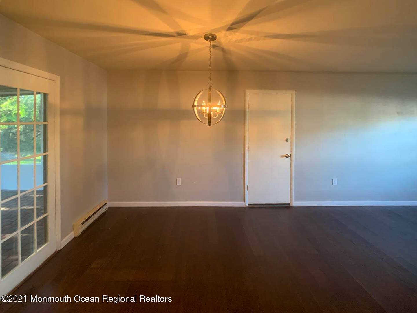 109 Beverly Drive Barnegat, NJ 08005 - Photo 8 of 20 en empty room with windows and ceiling fan