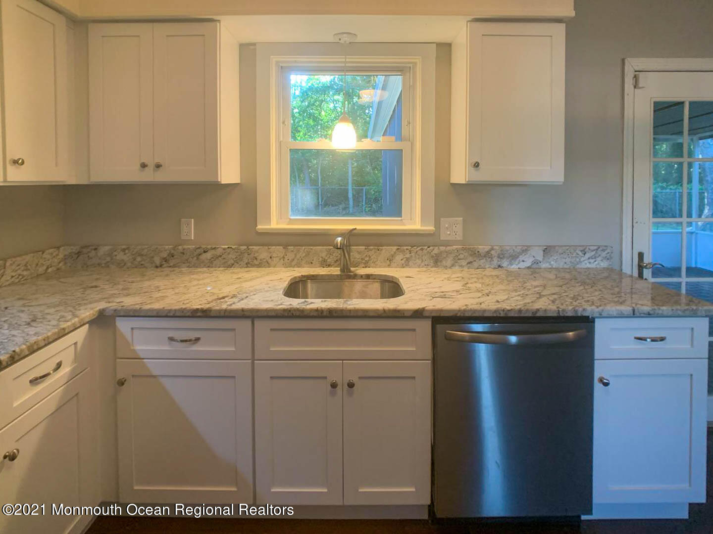 109 Beverly Drive Barnegat, NJ 08005 - Photo 10 of 20 a kitchen with granite countertop a sink window and cabinets