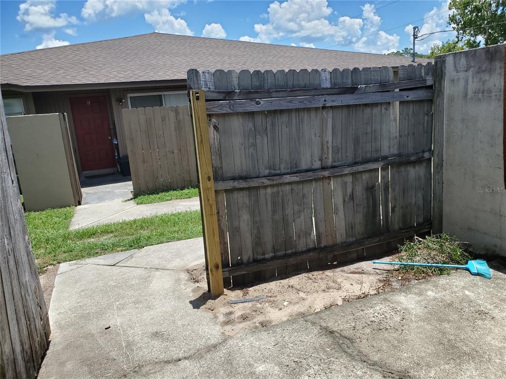 5375 Southeast 29th Place, Unit B Ocala, FL 34480 - Photo 2 of 11 a view of a backyard of the house