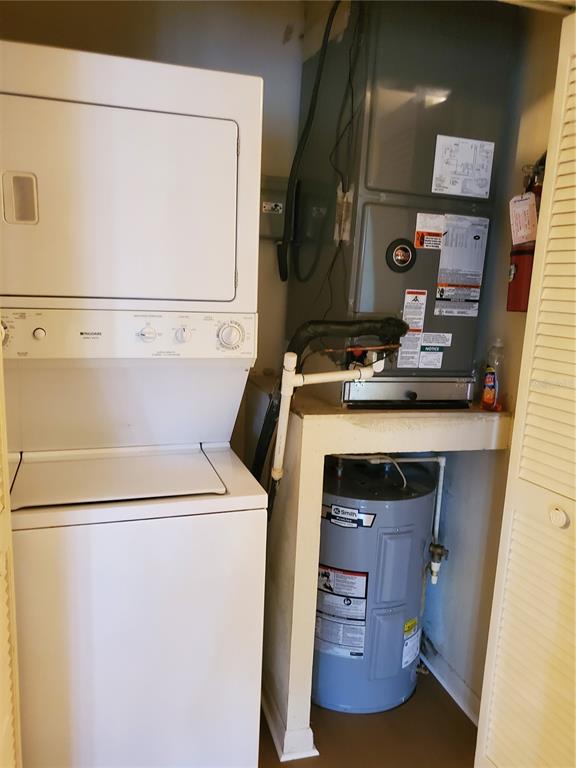 5375 Southeast 29th Place, Unit B Ocala, FL 34480 - Photo 8 of 11 a utility room with dryer and washer