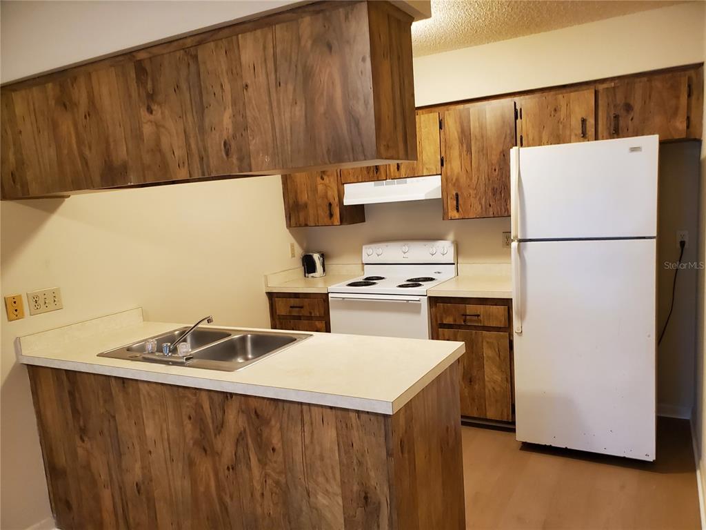 5375 Southeast 29th Place, Unit B Ocala, FL 34480 - Photo 9 of 11 a utility room with washer and dryer