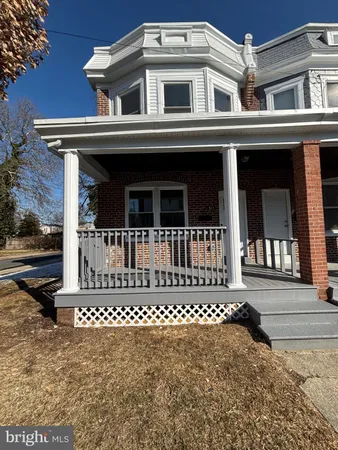 front view of a house with a street