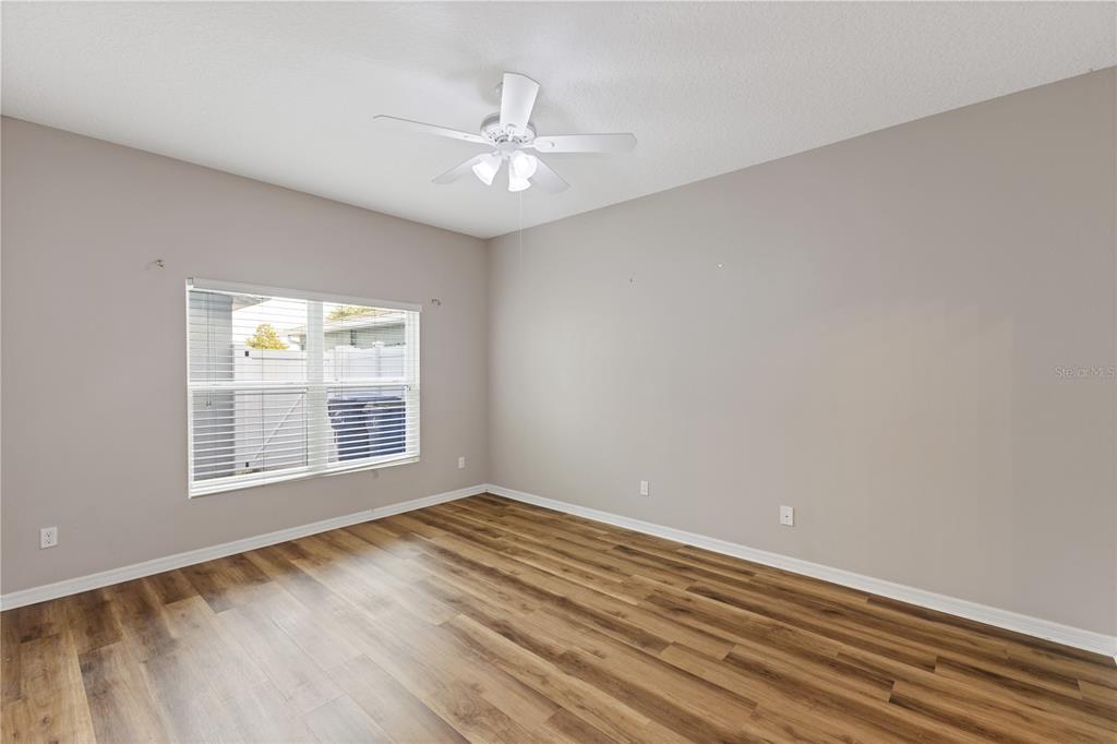 506 Rainbow Springs Loop Groveland, FL 34736 - Photo 10 of 30 a view of an empty room with a window