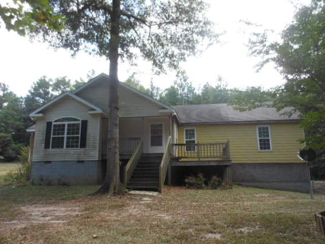 152 Morris Stevens Road Macon, GA 31217 - Photo 1 of 11 front view of a house with a yard