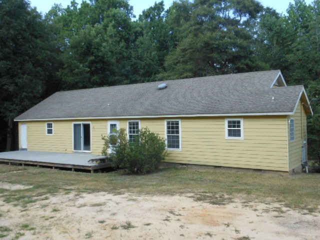 152 Morris Stevens Road Macon, GA 31217 - Photo 2 of 11 front view of house with a yard