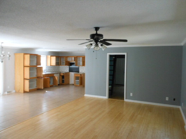 152 Morris Stevens Road Macon, GA 31217 - Photo 10 of 11 a view of a livingroom with a kitchen