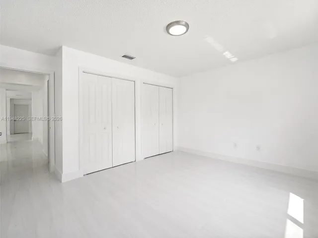 an empty room with a natural light