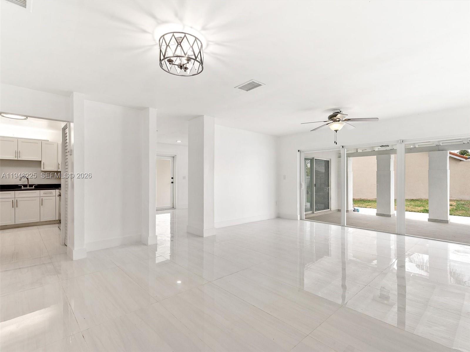 13841 Southwest 17th Terrace Miami, FL 33175 - Photo 15 of 31 a view of an empty room and kitchen view