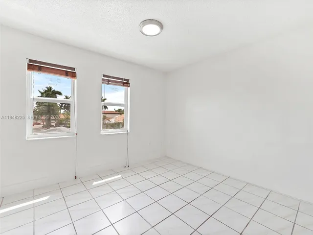 a view of an empty room with window