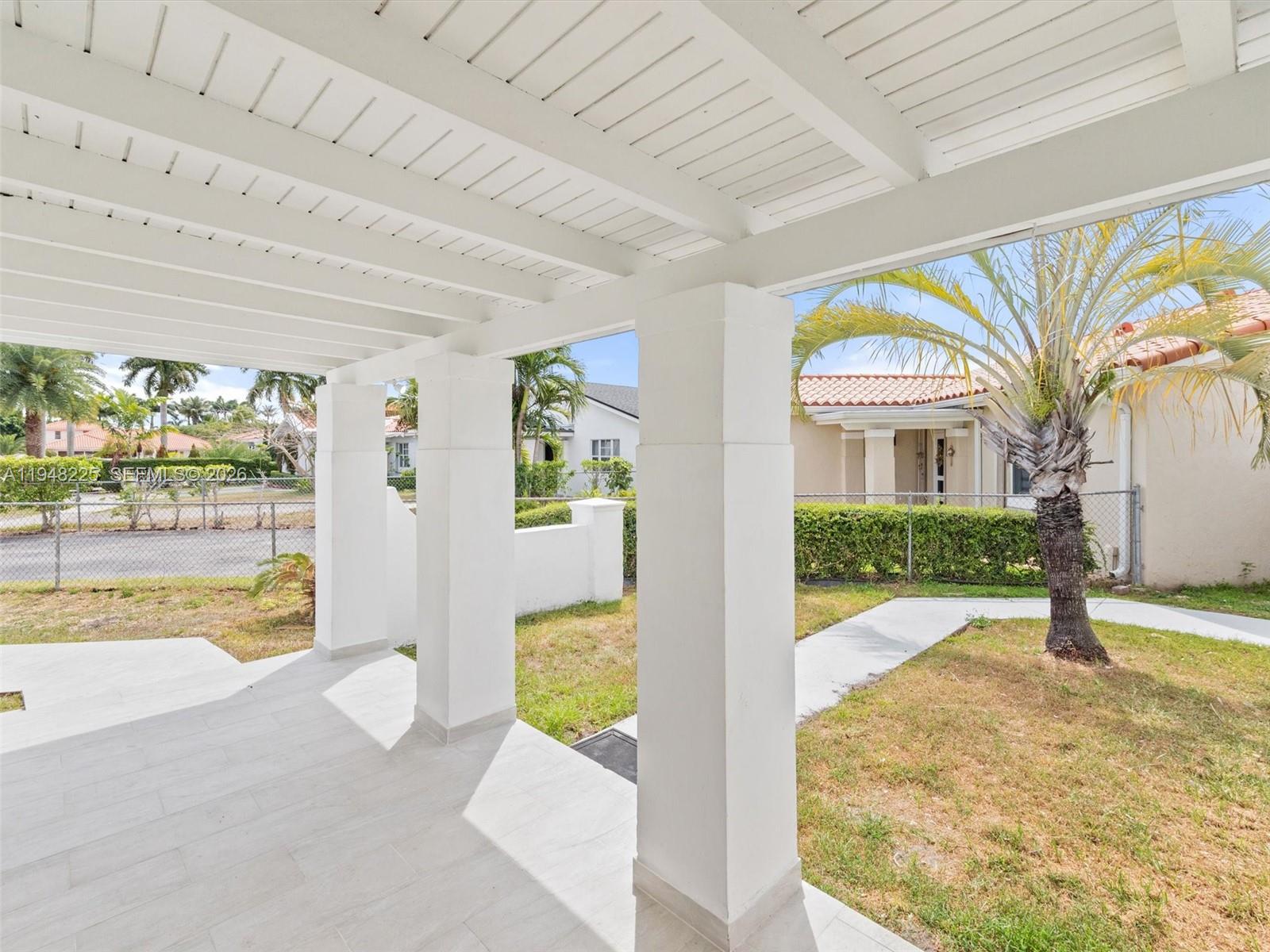 13841 Southwest 17th Terrace Miami, FL 33175 - Photo 28 of 31 a view of a swimming pool with an outdoor seating