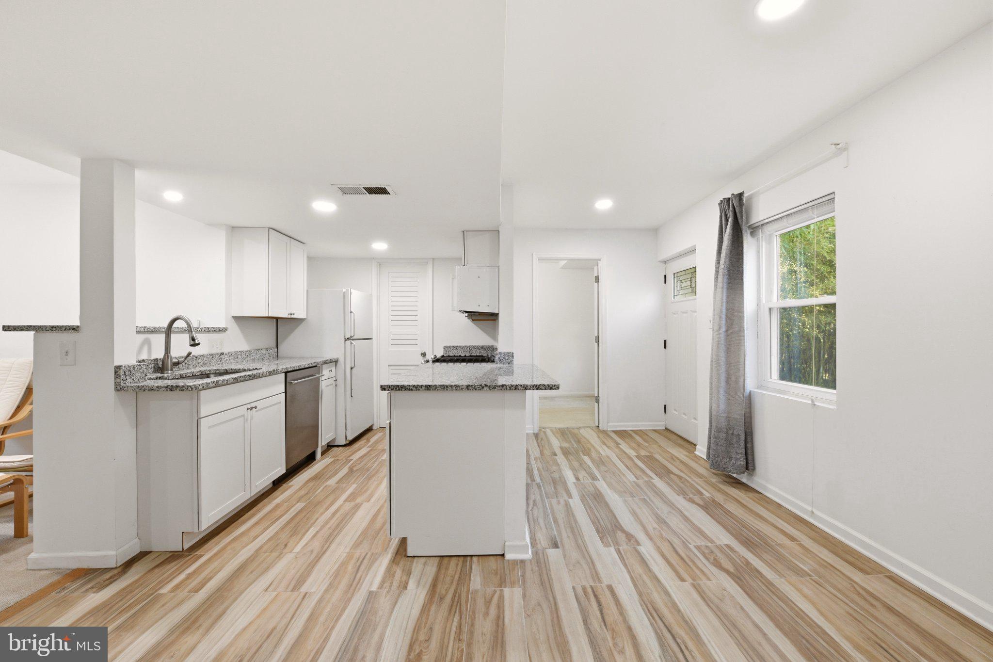 2311 Spencer Road Silver Spring, MD 20910 - Photo 24 of 36 Modern kitchen with sleek finishes.