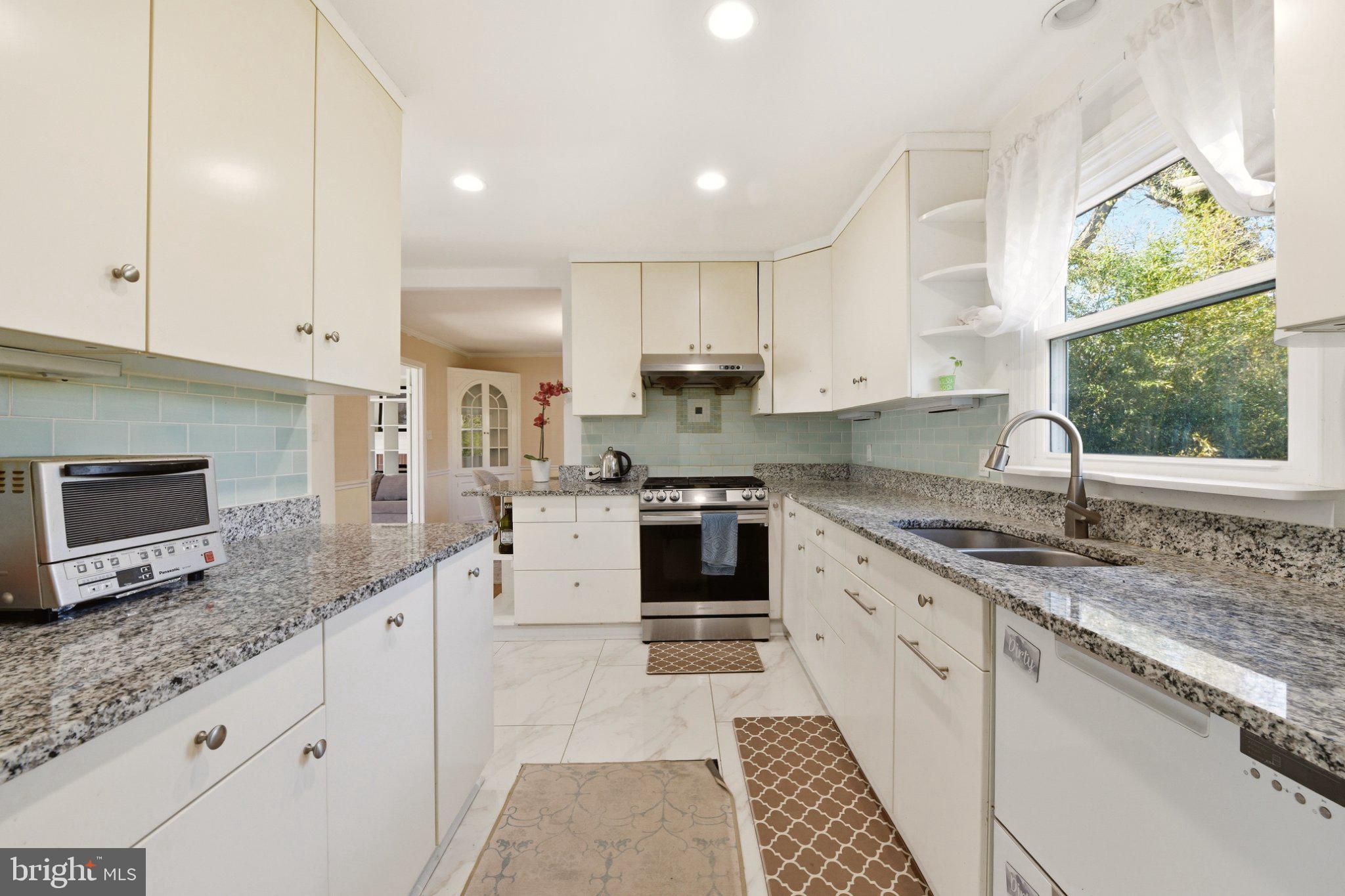 2311 Spencer Road Silver Spring, MD 20910 - Photo 9 of 36 Modern kitchen with sleek finishes.