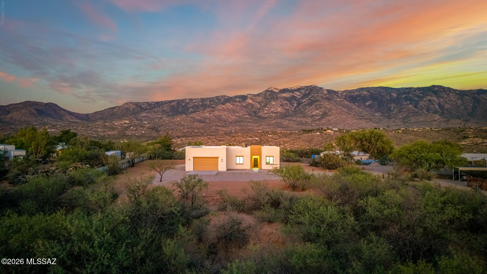 4601 East Magoo Road Tucson, AZ 85739 - Photo 31 of 38 a view of a city with mountains in the background