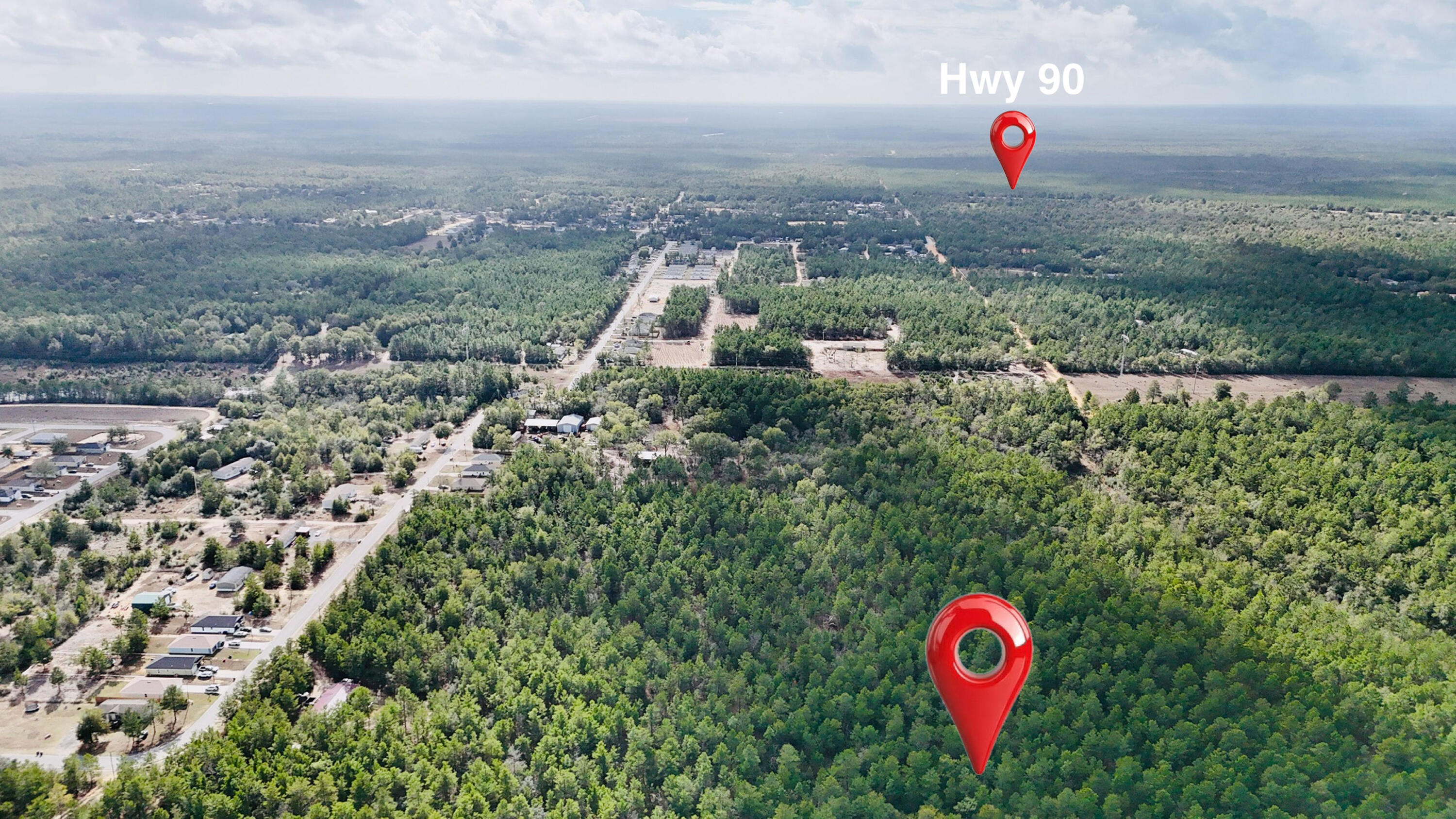 0 Kervin Road Crestview, FL 32539 - Photo 2 of 3 a view of a area with red and white house