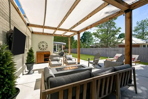a view of balcony with wooden floor and windows