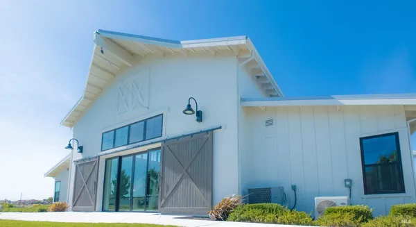 a front view of a house with garage