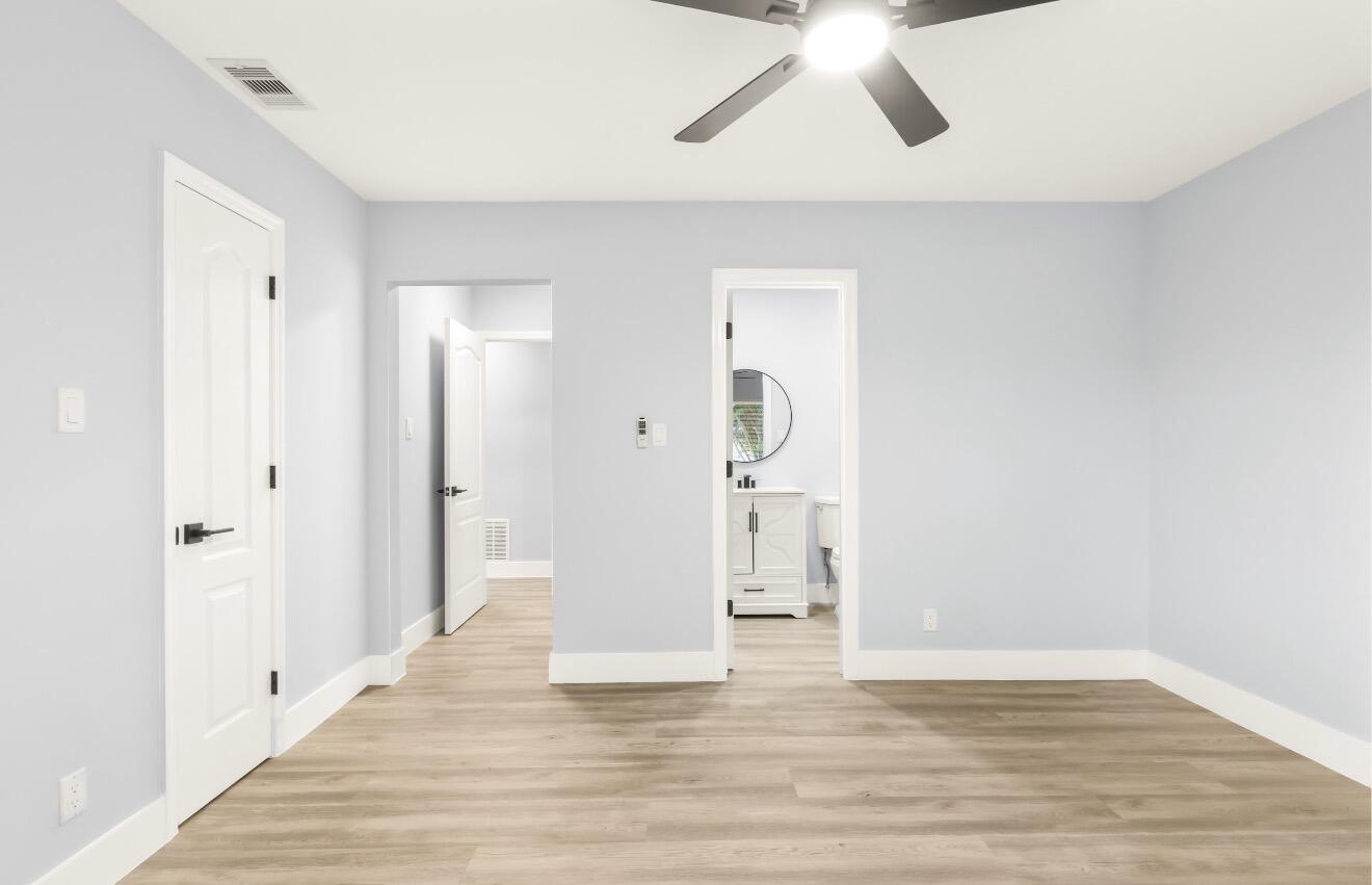 6717 Northwest 60th Street Tamarac, FL 33321 - Photo 20 of 26 a view of empty room with wooden floor