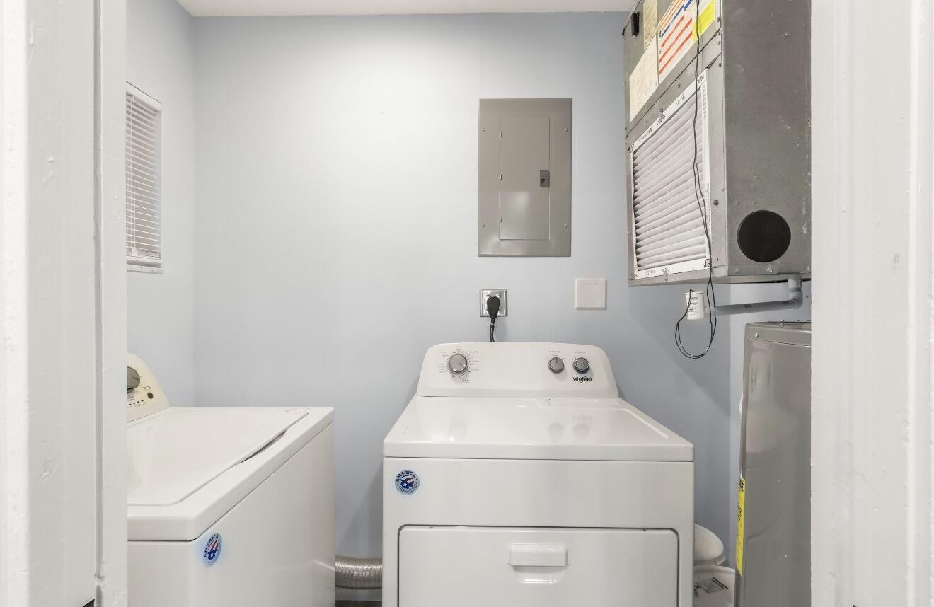 6717 Northwest 60th Street Tamarac, FL 33321 - Photo 26 of 26 a utility room with dryer and washer