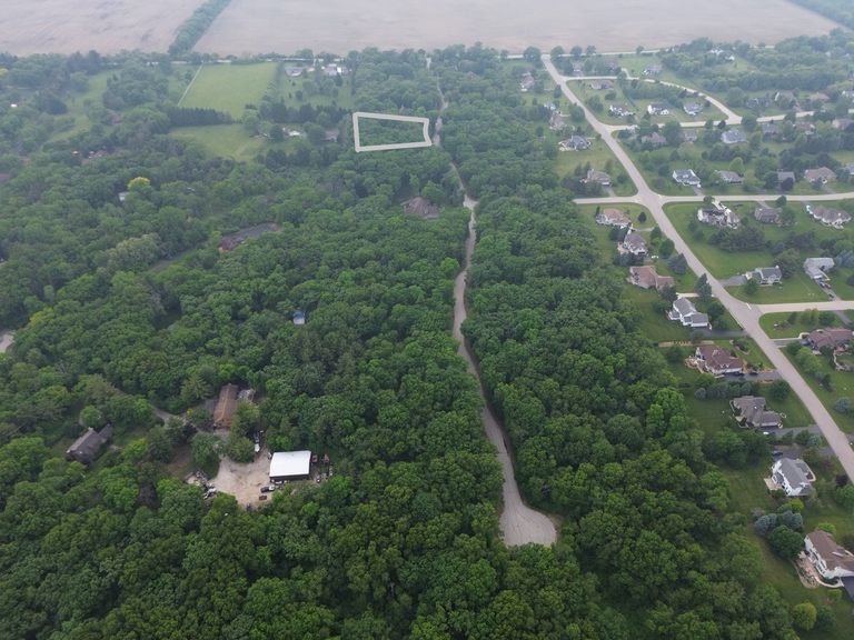 7407 Forest Oak Drive McHenry, IL 60050 - Photo 3 of 11 a view of a forest from a balcony