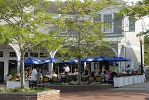 105 Shellback Way, Unit 105 Mashpee, MA 02649 - Photo 23 of 26 a view of a cafe with a tree