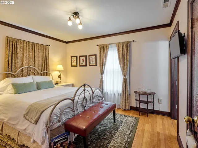 a bathroom with a shower toilet and sink