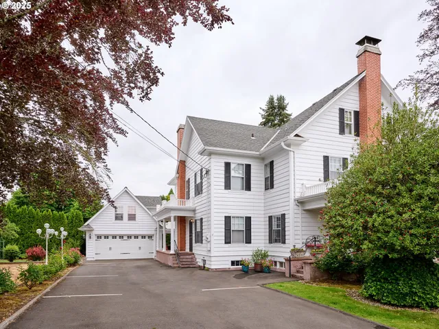 a view of a chairs and table in patio of the house